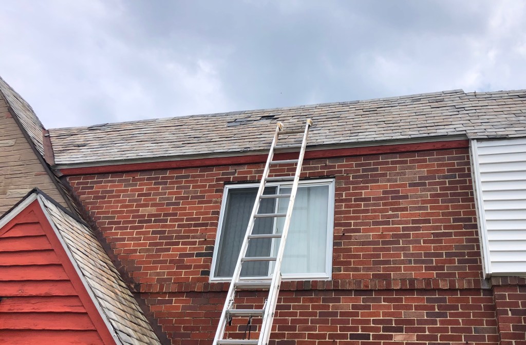 Hole in middle of slate roof