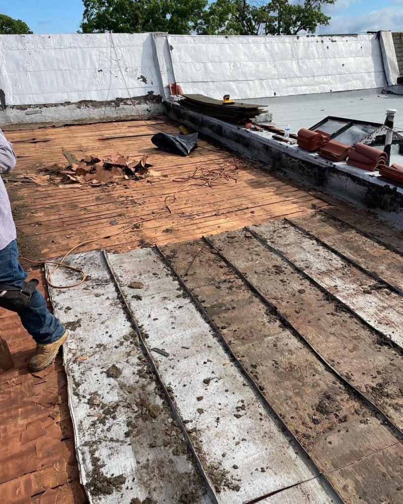 Roof being removed in preparation of replacement 